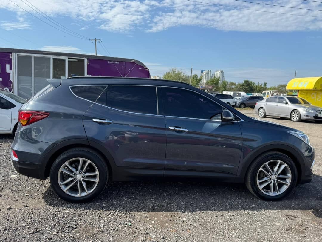 2016 Hyundai Santa Fe VIN: KMHSW81UBGU665718 Lot: 400097859