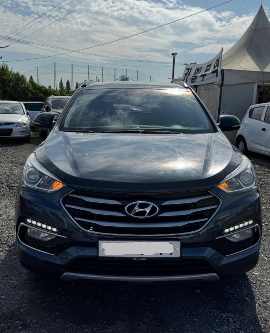 2016 Hyundai Santa Fe VIN: KMHSW81UBGU665718 Lot: 400097859
